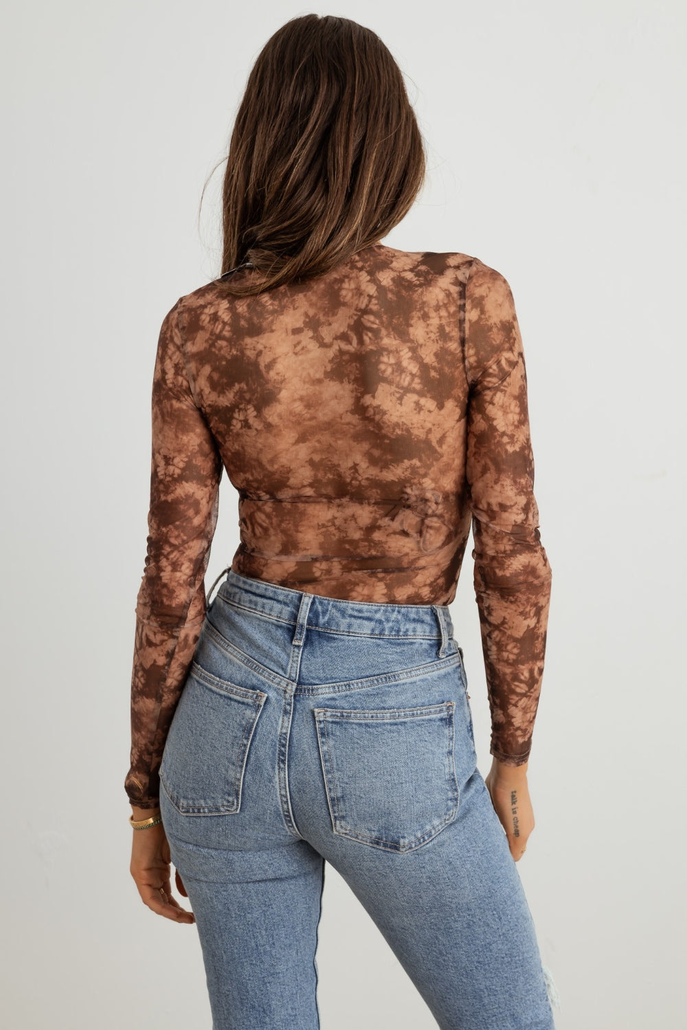 Abstract Mesh Lace-Up Long Sleeve Bodysuit - Trendy Women's Fashion Staple for a Chic Look!