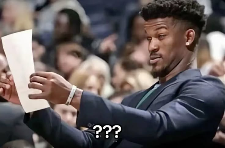 Jimmy Butler Looking at Paper Meme, Explained