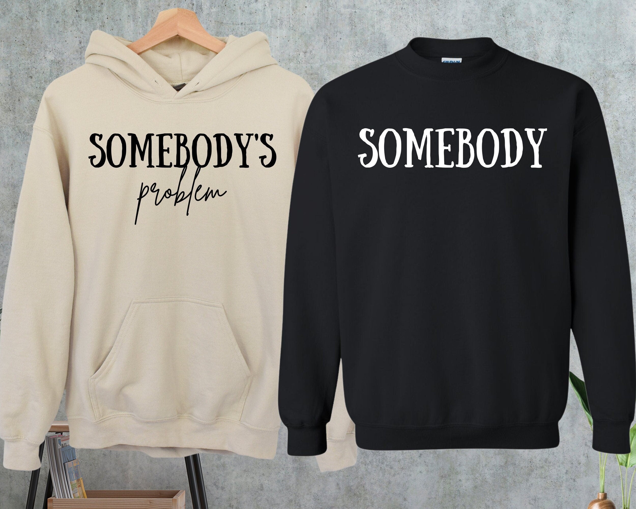 Stay Cozy and Playful with 'Somebody's Problem' Couple Sweatshirts