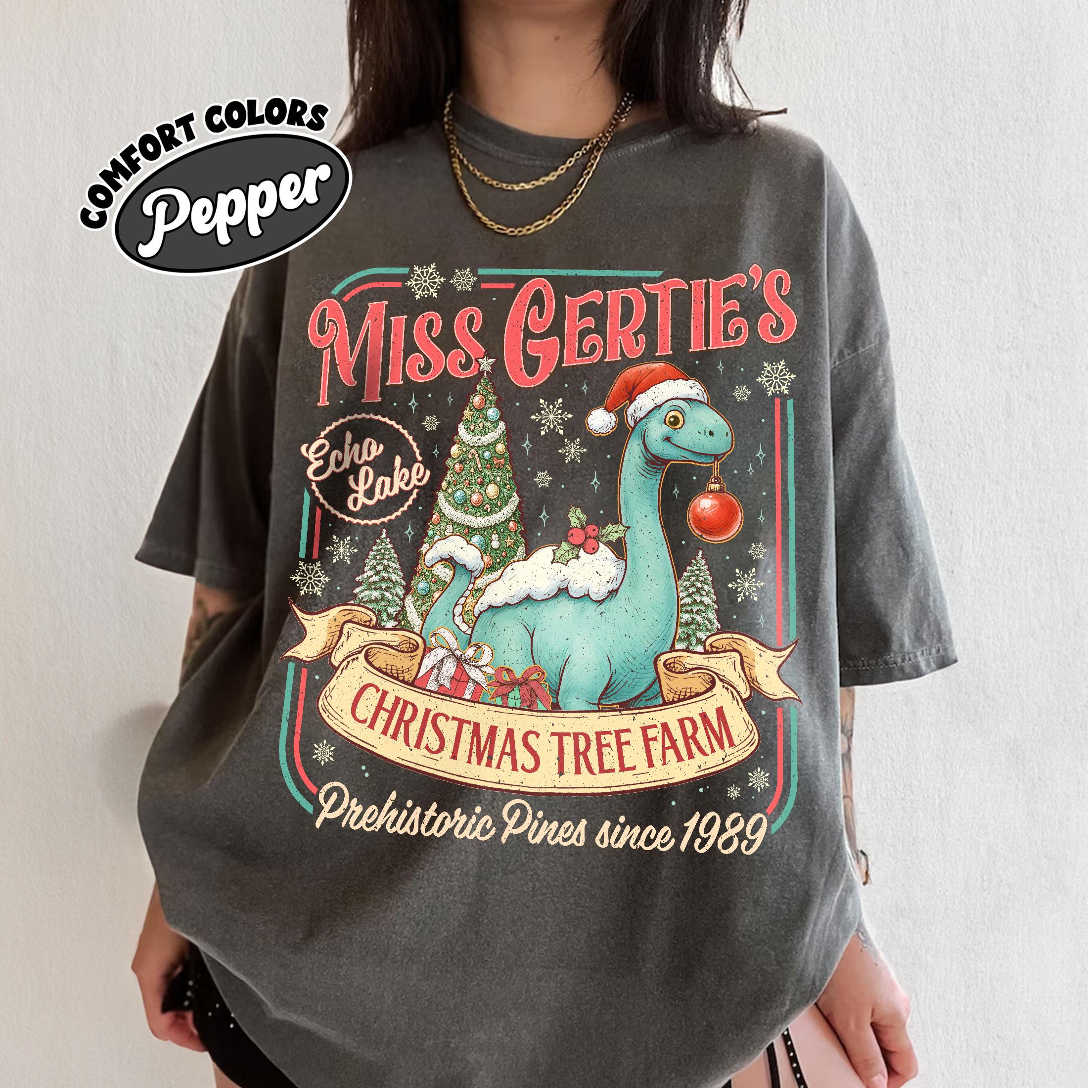 Dinosaur Christmas Tree Farm Comfort Colors® 1717 Unisex Garment-Dyed T-shirt, Theme Park Holiday Tee for Women & Men, Miss Gertie's Xmas Gift, Aesthetic Vacation Outfit