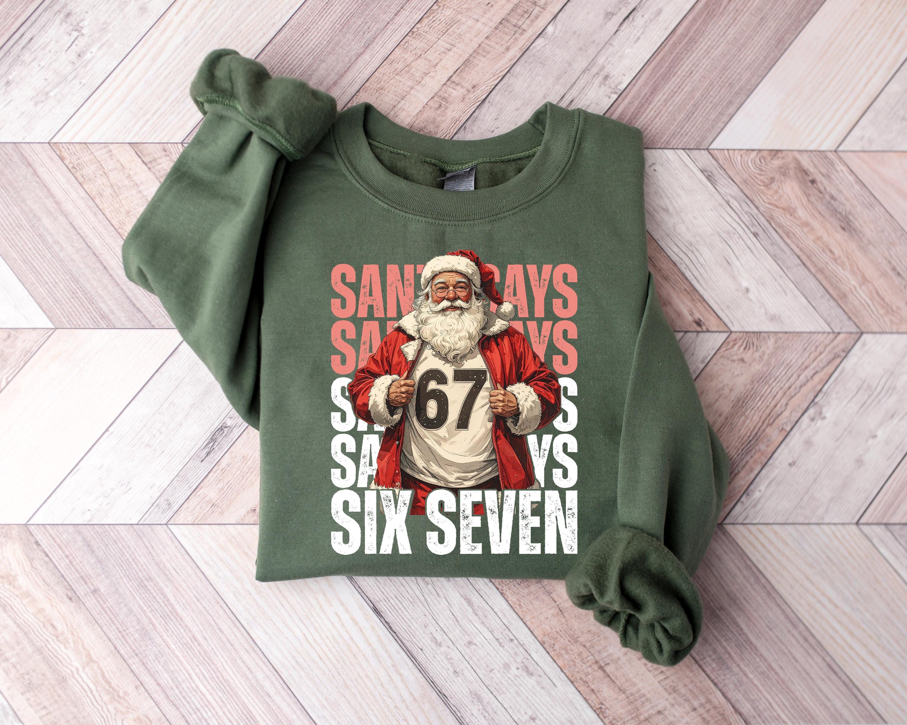 Santa Says Six Seven Gildan 18000 Shirt, Funny Christmas Meme Hoodie, Retro Xmas Long Sleeve for Men & Women, Printify Choice Holiday Outfit, Viral Internet Joke Gift